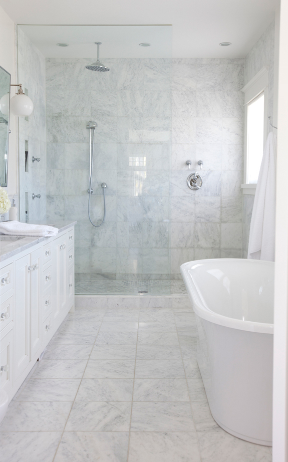 The first bathroom is clad with white marble, it's very luxurious and elegant