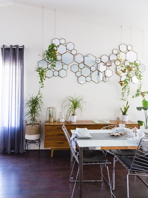 A hex framed mirror arrangement is a cool and eye catchy decoration for this space