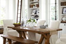 10 in this white space the trestle dining table is highlighted with a matching bench