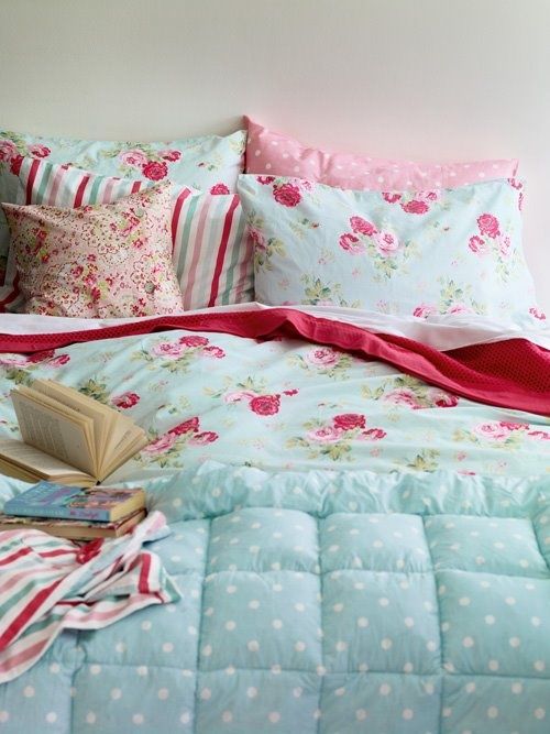 mint blue, white and pink bedding set with polka dots, floral prints and stripes