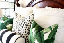 11 tropical leaf print pillows will spruce up your bedroom and make it summery