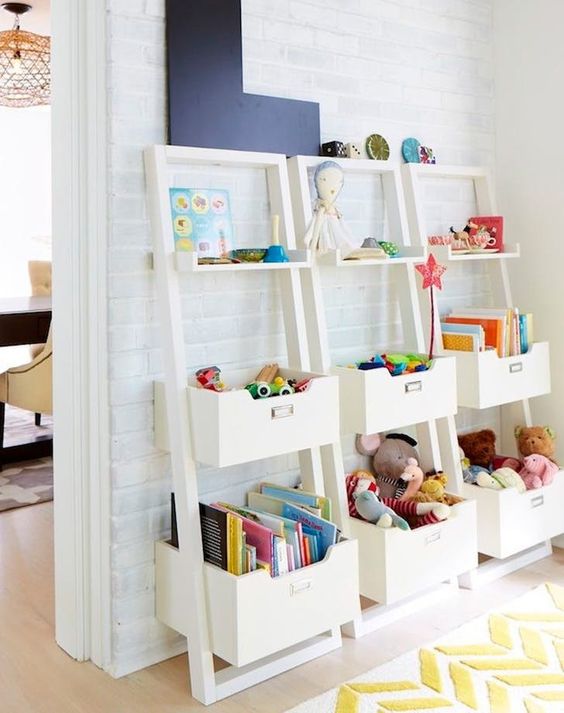 white shelving units with open shelves and boxes look nice and are comfy in using