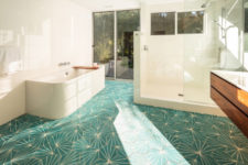 13 The bathroom boasts of green geo tiles and a gorgeous view, plus it can be opened to outdoors