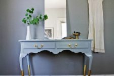 14 a vintage desk painted blue, with gilded legs and brass handles to use as a vanity