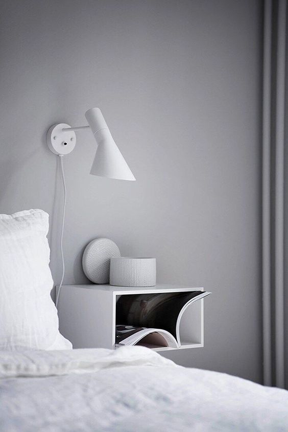 a white open box bedside piece for a minimalist or Scandinavian bedroom