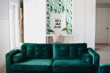 15 two emerald velvet sofas echo a cactus print wall