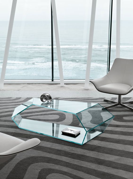 unique sculptural glass coffee table will add eye-catchiness to your interior