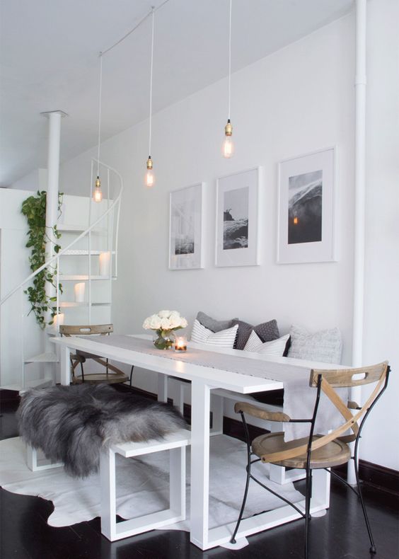 all-white everything with very dark stained wooden floors and a white rug to soften it