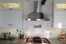 18 add a glam touch to your kitchen with a gorgeous mother of pearl tile backsplash