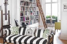 18 make a white space more eye-catchy with a striped black and white sofa