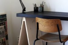 19 adapt your trestle desk to the style of your space like here – the desktop was painted black to make it look more masculine