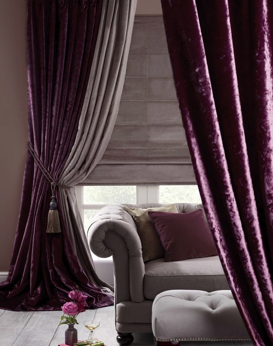 a decadent space can be made more refined and lush with purple velvet curtains