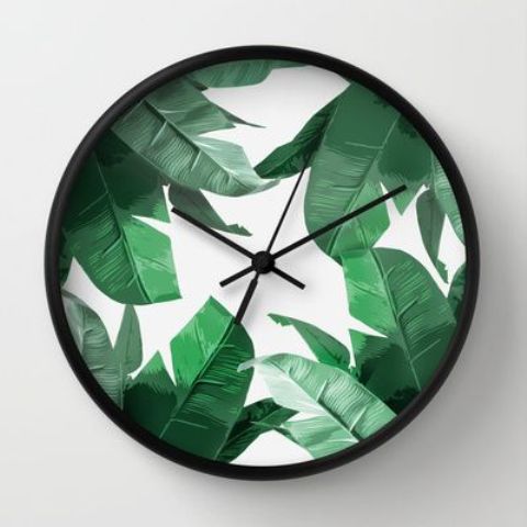 palm leaf print wall clock can be made on your own, you just need some self-adhesive wallpaper