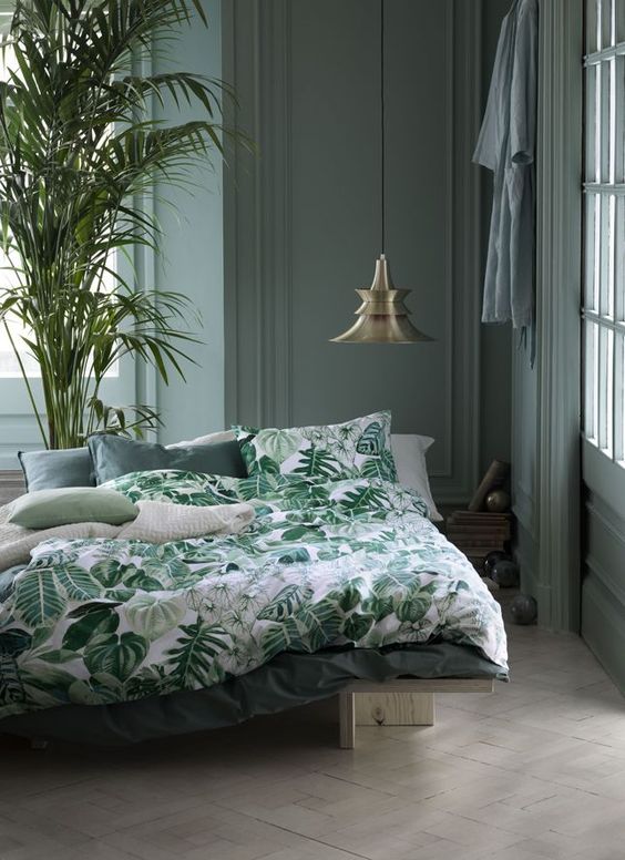emerald, dark green and white bedding set with a botanical print and plain parts
