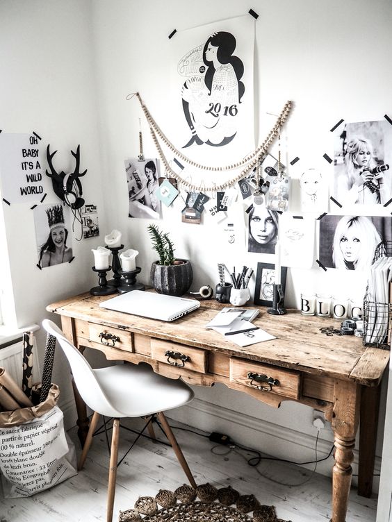 a Scandinavian home office made cozier with a rustic vintage desk with antique handles