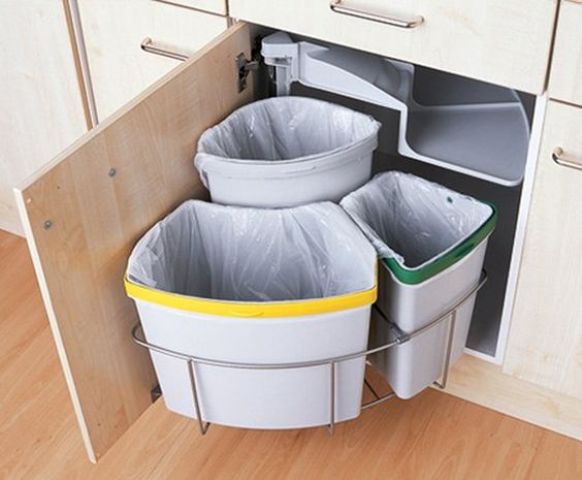 a rotating trash can allows to accomodate more trash cans and comfortable using