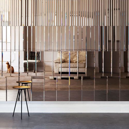 mirror panel wall looks very eye-catching and it's a unique idea for a statement wall