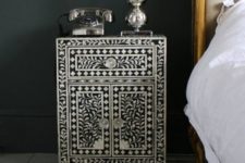 25 a refined black nightstand clad with mother of pearl looks vintage and very refined