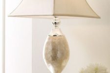 26 a refined table lamp covered with mother of pearl will add even more chic to your interior