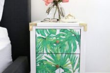 26 a tropical leaf nightstand with chic metallic touches