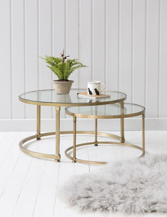 brass round coffee table duo with glass tabletops