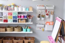 26 display children’s art pieces on the wall to make them proud