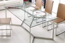 28 a chic and edgy dining table with a metal framing and a glass tabletop looks amazing