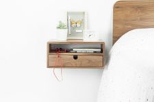 28 a tiny stylish wooden nightstand with an open storage space and a drawer