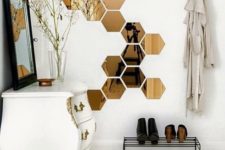 28 such hexagonal mirror decals will make the space more interesting
