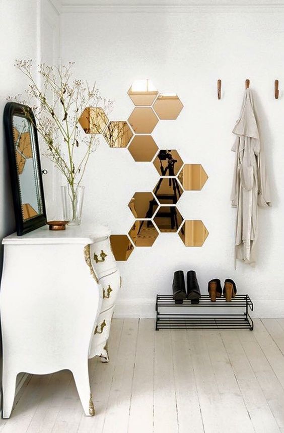 such hexagonal mirror decals will make the space more interesting