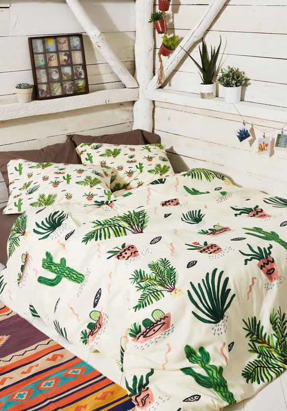 whimsy and funny cactus print bedding in green and pink hues