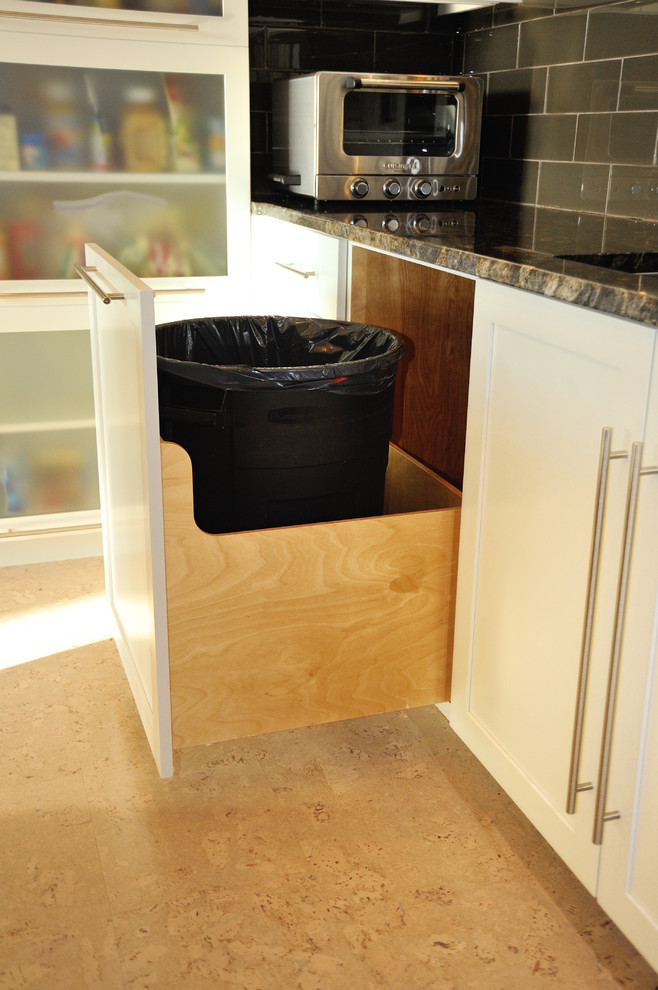 a family size trash can in a pull out cabinet (Kevin Martin)