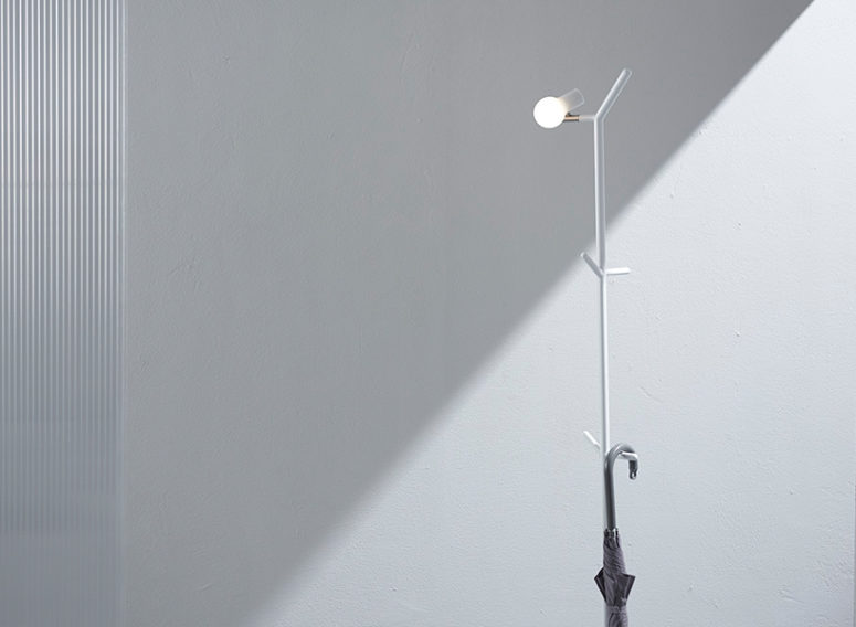 Myna is a minimalist piece for the hallway, and it comprises a coat rack and a floor lamp in one without having too many details