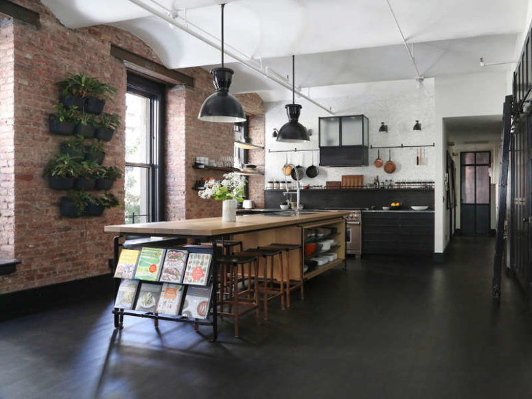 Industrial Loft With Exposed Brick Walls And Black Wood