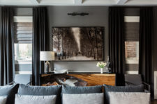 01 This stunning dramatic home with an artistic feel, bold accents and moody spaces can be called jaw-dropping because some of the spaces will really make you do that