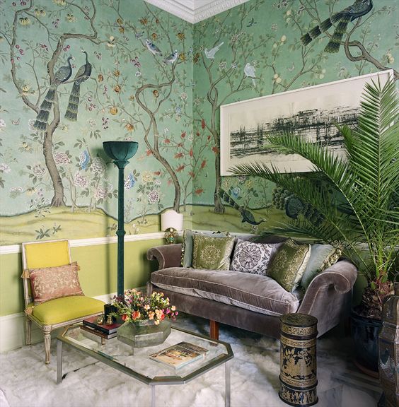 The living room features unique silk wallpaper, velvet furniture and soft textiles