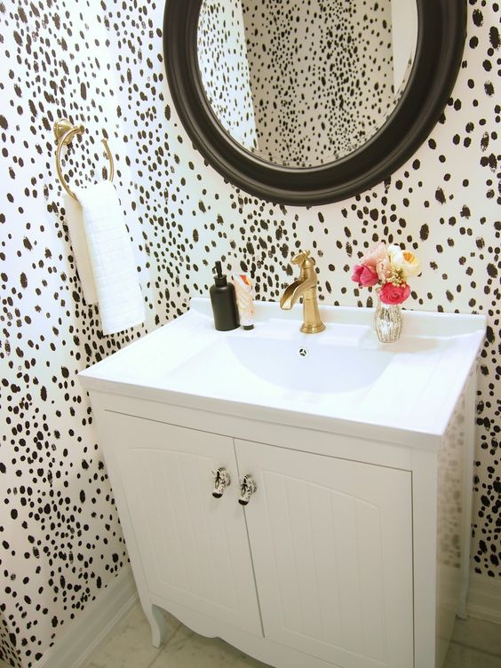 dalmatian print wallpaper to make a powder room more eye-catching and glam