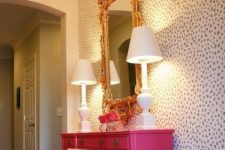 03 glam dalmatian print statement wall for a bold hallway and a hit pink console to nail it