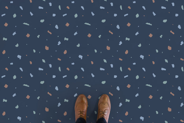 Fleck floors in blue have a navy base, which can fit a coastal or beach home
