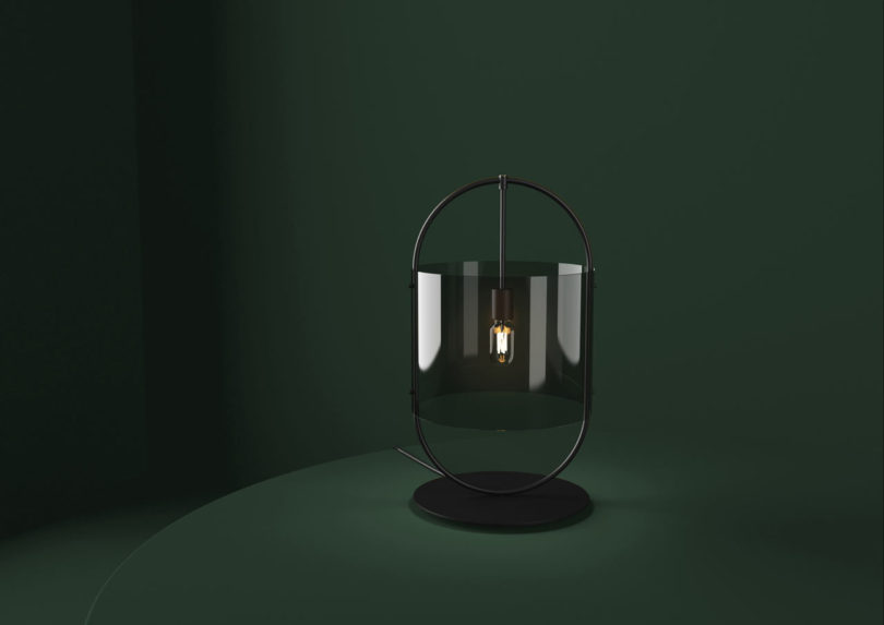 The glass version has no metal mesh, it's substituted with a smoked glass lampshade