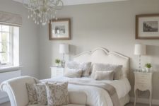 05 a white glam chandelier and traditional lamps for the bedside