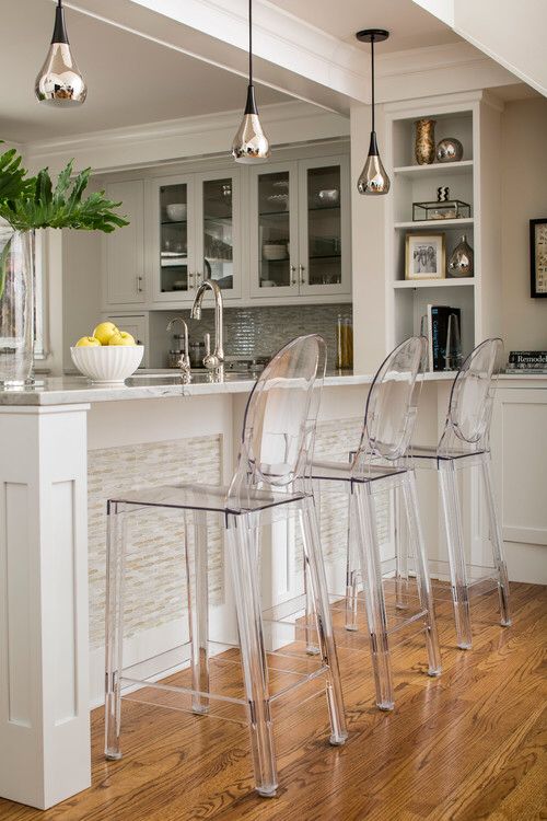 accantuate a bar counter with gorgeous sheer acrylic chairs for a modern twist