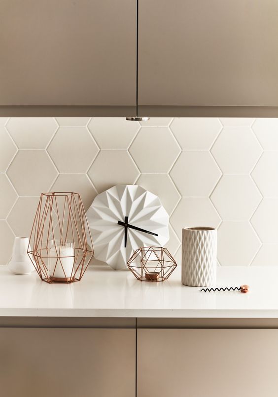 matte white tiles with white grout make up a gorgeous textural backsplash