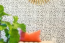 06 dalmatian print wallpaper makes this entryway eye-catchy and brass accents add glam