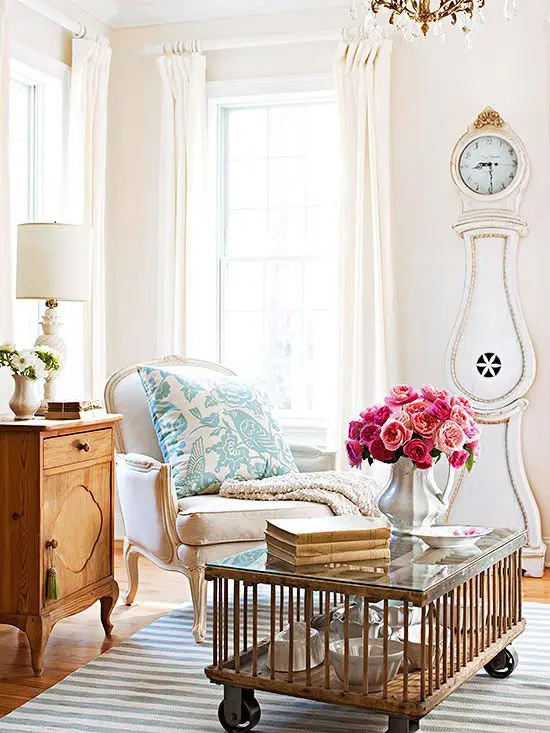 a chic living room with a refined flavor and a gorgeous white and gold grandfather's clock