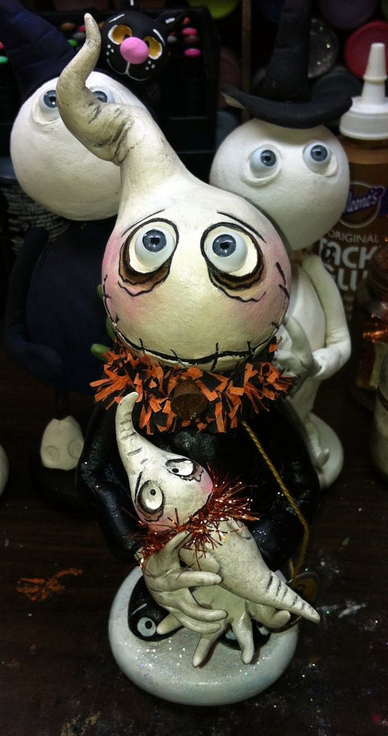 grimmy ghost dolls make up a gorgeous Halloween decoration for any home