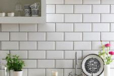08 subway tiles with dark grout for definition and open cabinets are a fresh take on a traditional white kitchen