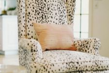 09 a cozy dalmatian print upholstered chair is a great idea for sprucing up the interior