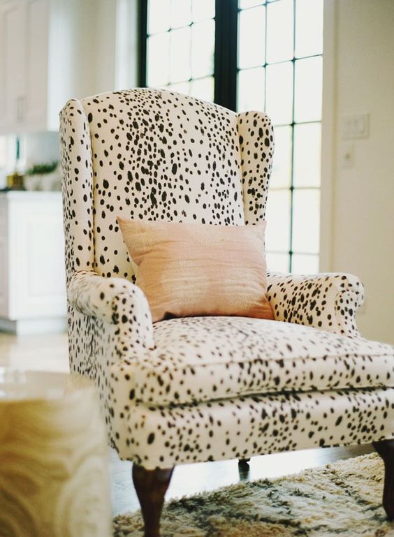A cozy dalmatian print upholstered chair is a great idea for sprucing up the interior