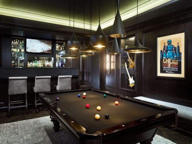 modern dark man room with a home bar and a pool table - who needs more than that